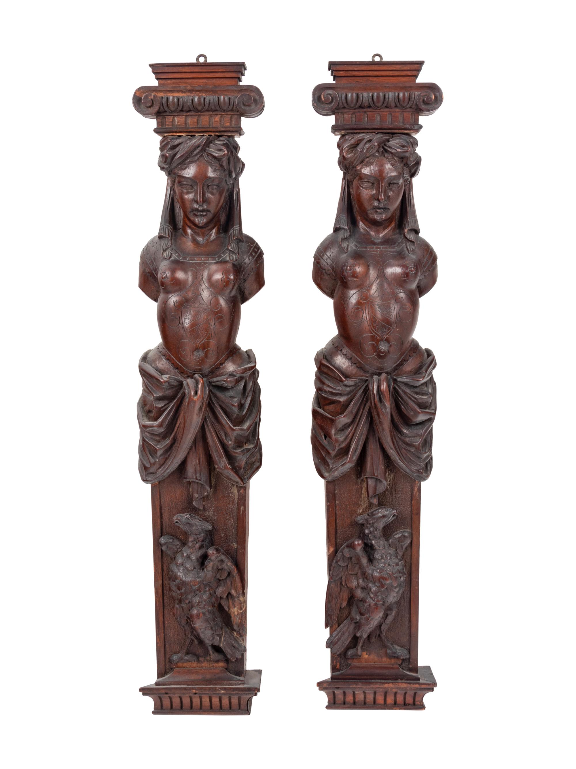 A Pair of French Carved Walnut Figural Ornaments