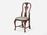 A Queen Anne walnut and walnut veneer balloon seat side chair, Ireland, circa 1725