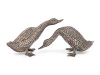 Two Silver Duck Figures