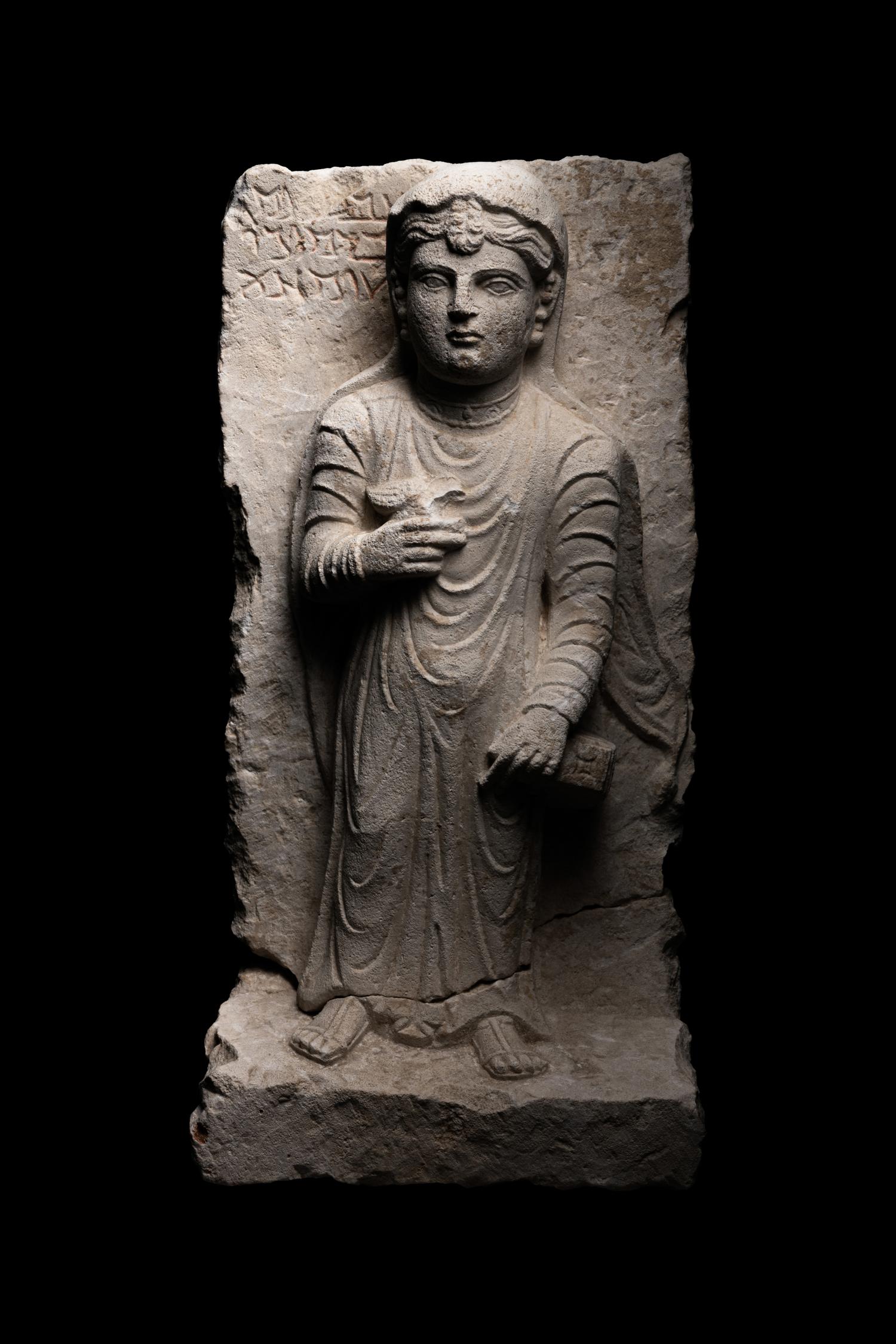 A Palmyran Limestone Relief of a Woman