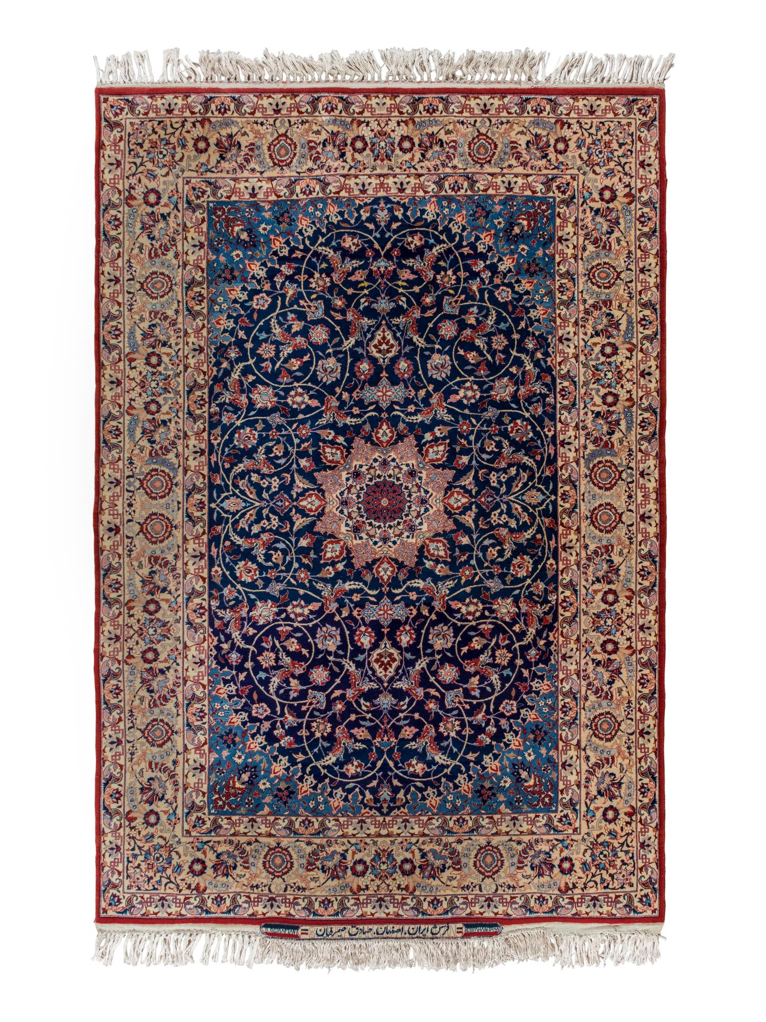 A Signed Isfahan Silk Rug