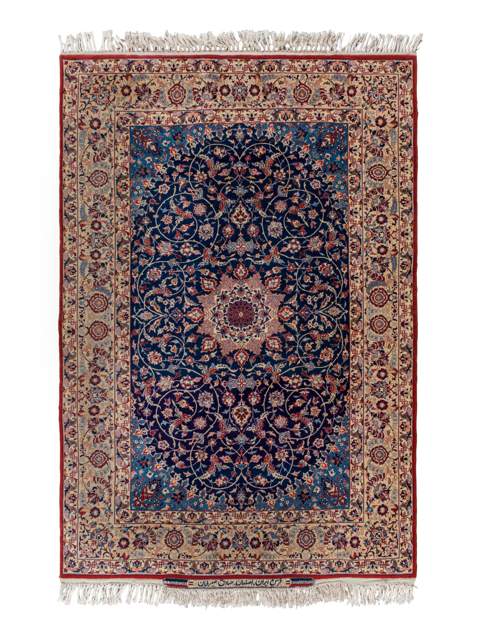 A Signed Isfahan Silk Rug