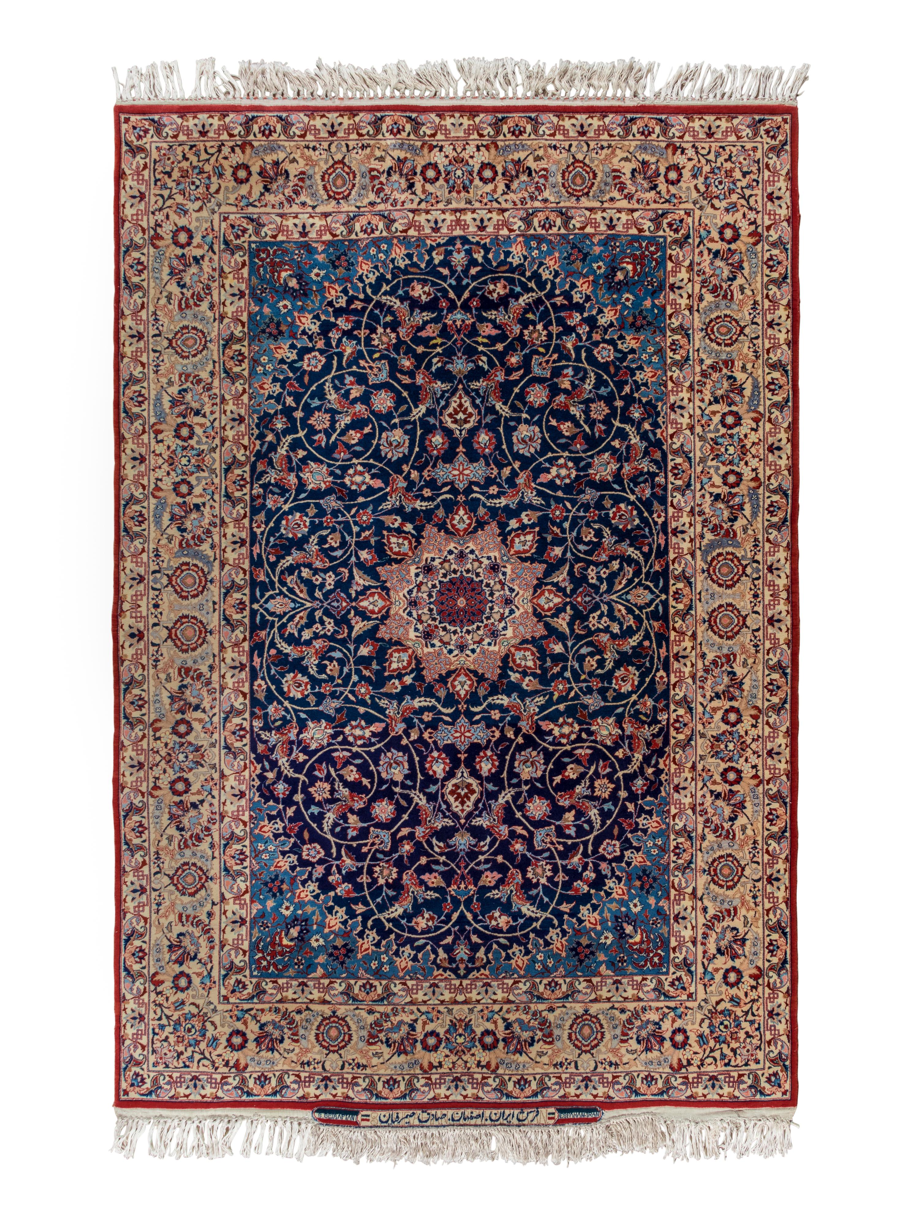 A Signed Isfahan Silk Rug