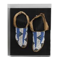 A Pair of Sioux Mocassins Length 11 inches — FIRST QUARTER 20TH CENTURY