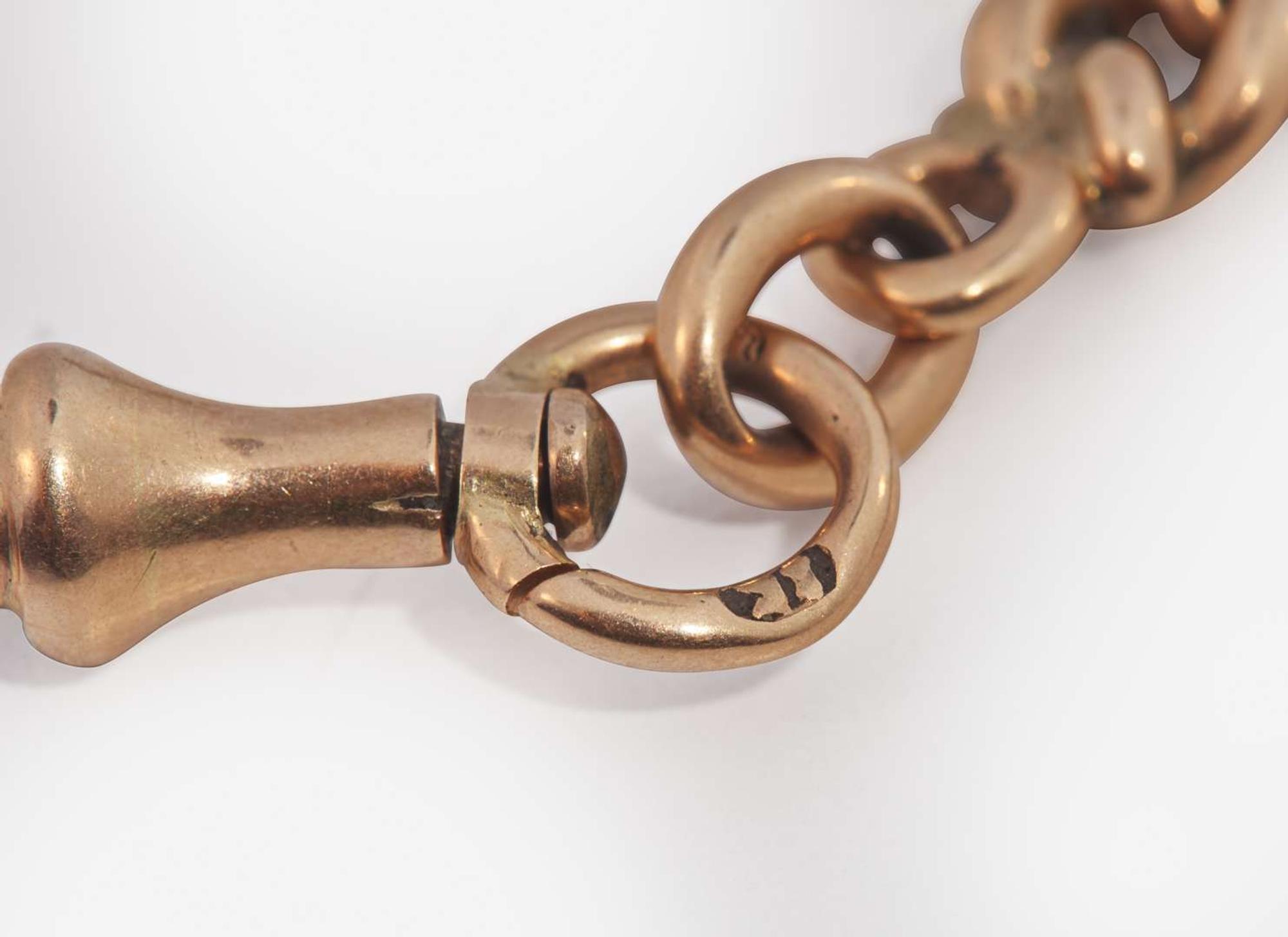 A Two-Tone Gold Pocket Watch Chain