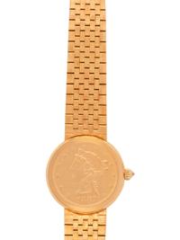 CORUM, 18K YELLOW GOLD US $5 COIN WRISTWATCH