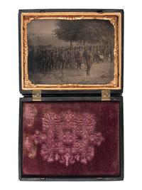 [CIVIL WAR]. Quarter plate tintype of Union officers leading western Infantry company. N.p.: N.p., [1861-1865].