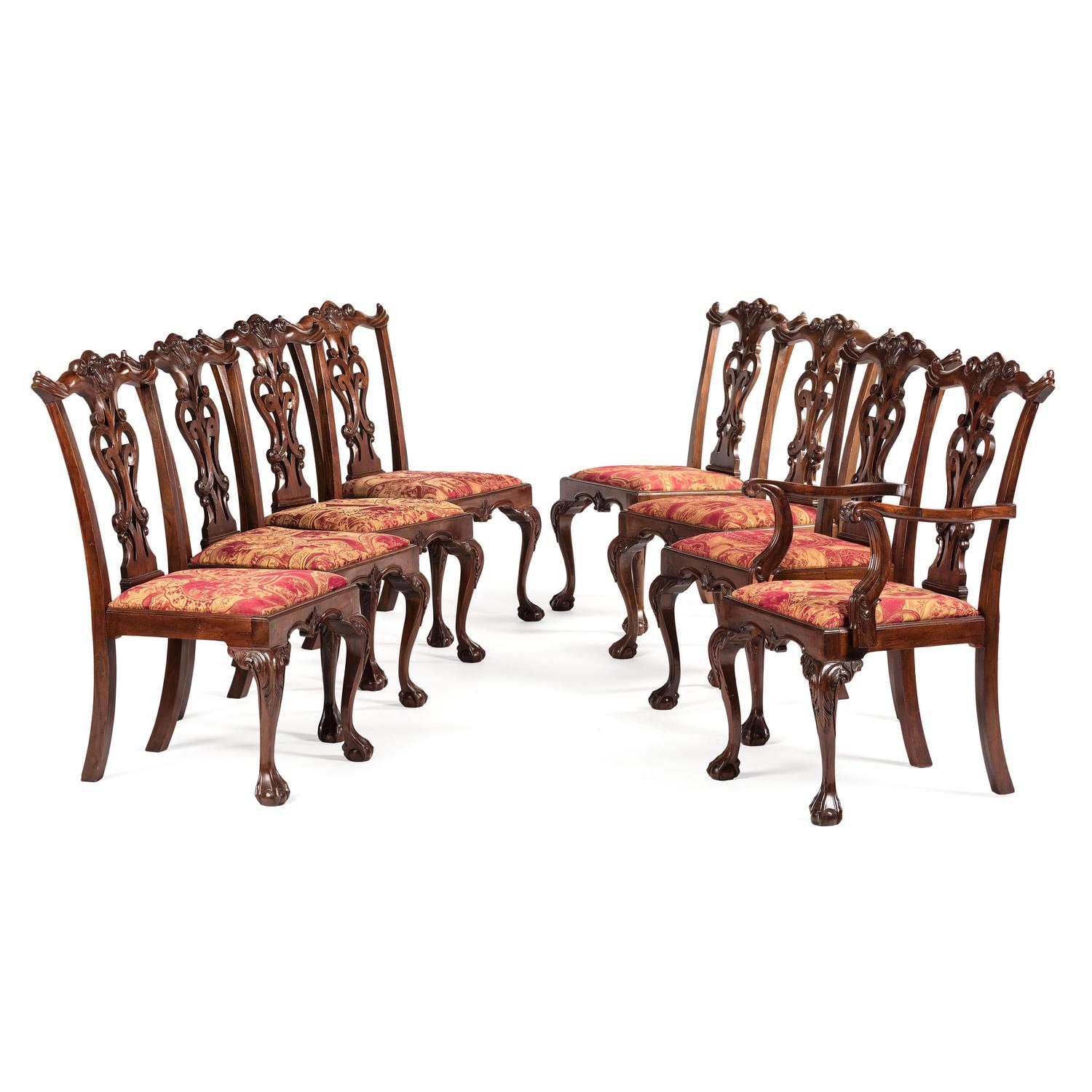 A Set of Eight Chippendale-Style Carved Mahogany Dining Chairs
