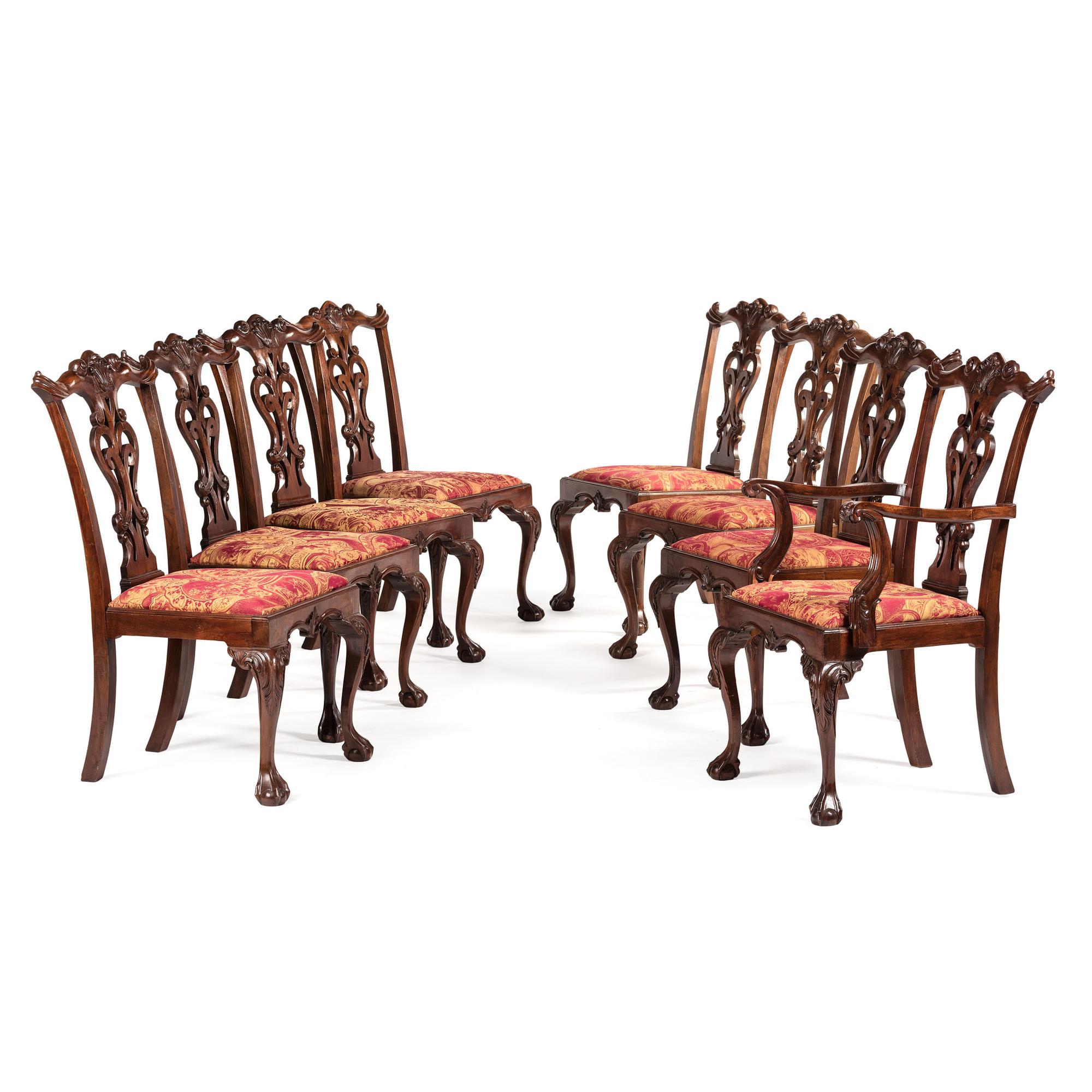 A Set of Eight Chippendale-Style Carved Mahogany Dining Chairs
