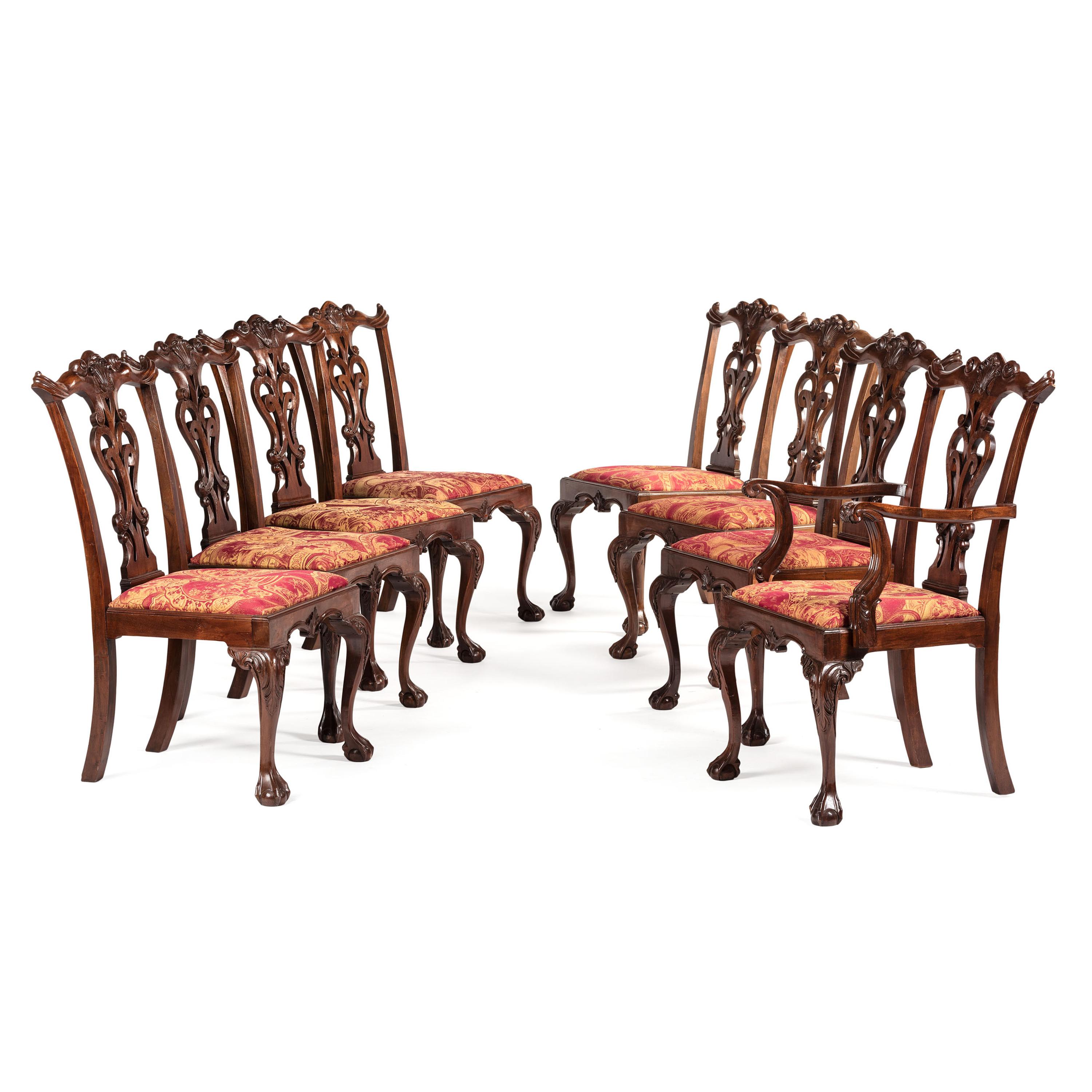 A Set of Eight Chippendale-Style Carved Mahogany Dining Chairs