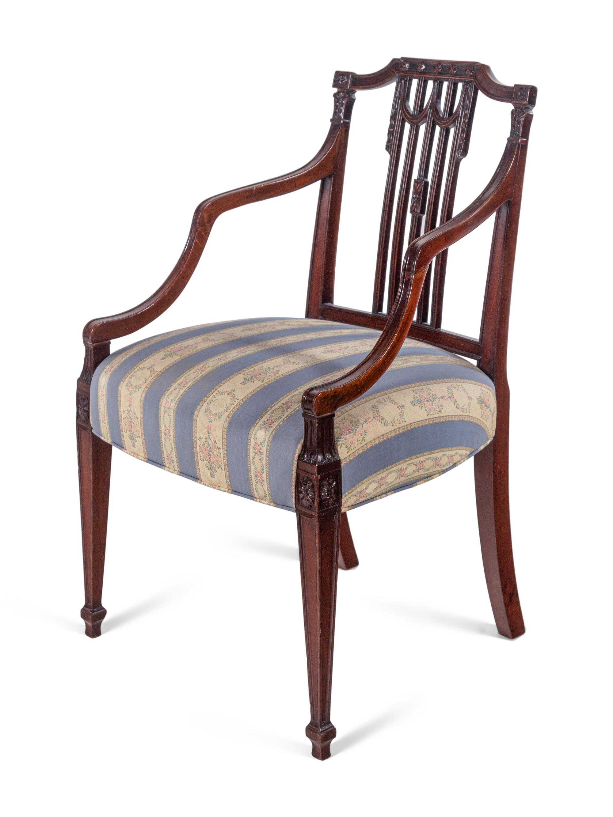 A George III Carved Mahogany Armchair
