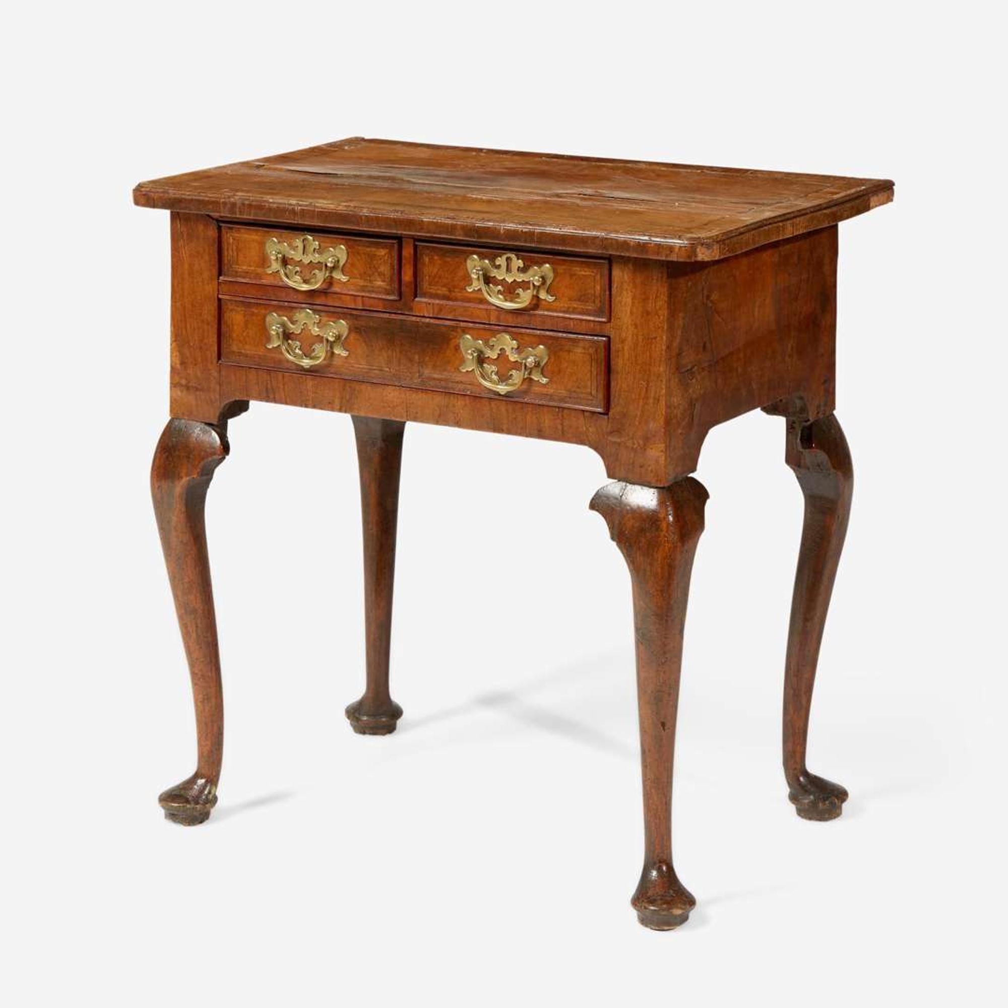 A Queen Anne inlaid and veneered walnut dressing table circa 1730
