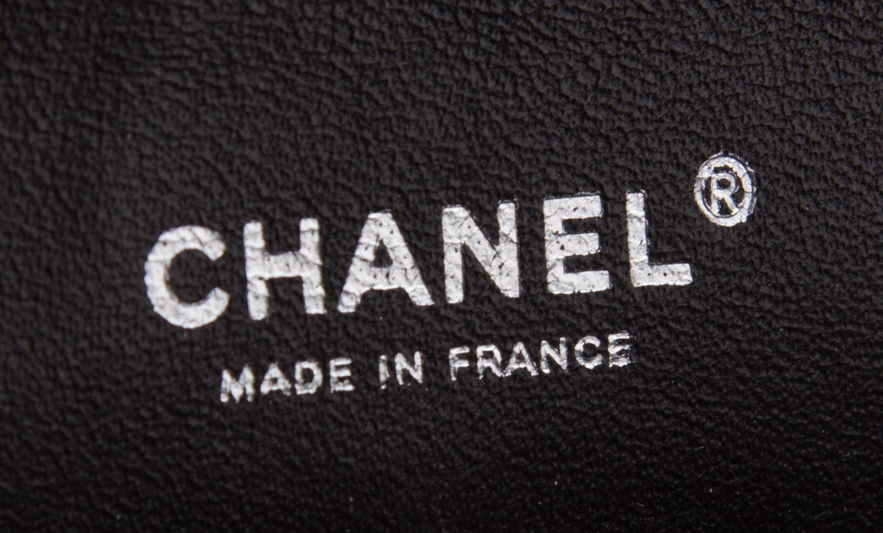 A Chanel Brown Caviar Leather Double Flap Handbag, 10" x 6.5" x 2.5".