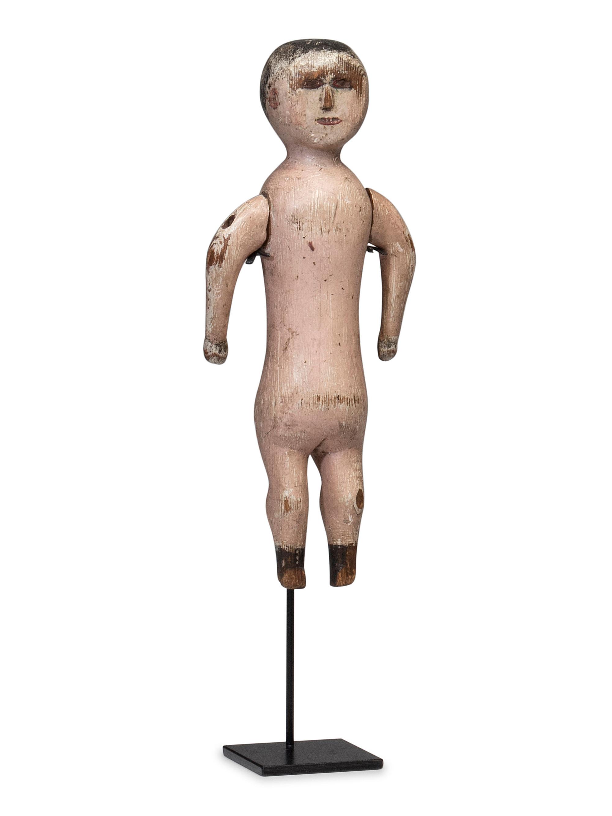 A Carved and Painted Wood Whirligig