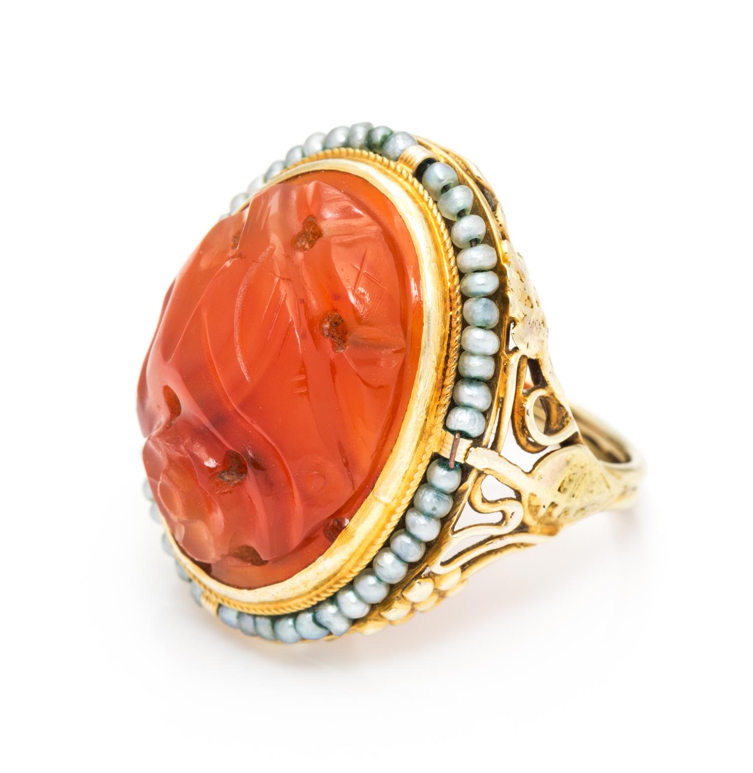 A Yellow Gold, Seed Pearl and Agate Ring, 4.60 dwts.