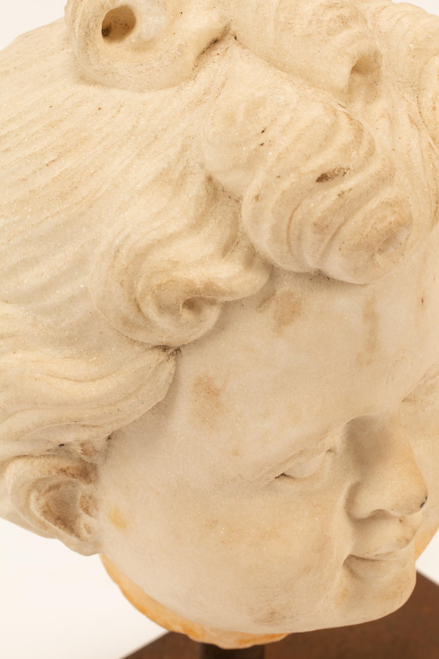 An Italian Carved Marble Head of a Youth