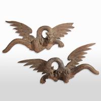 A pair of Italian carved walnut Chimera Probably Florentine, 18th / 19th century