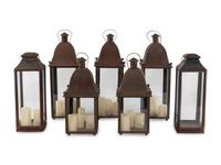 A Group of Eight Patinated Sheet Metal Garden Lanterns