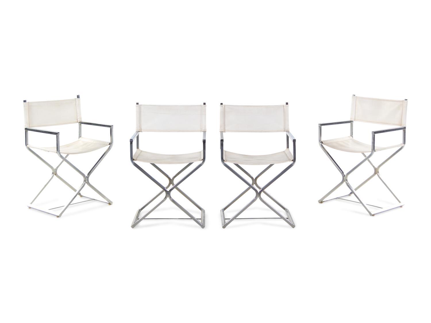 A Set of Four Campaign Style Chairs in the Style of Milo Baughman
