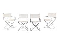 A Set of Four Campaign Style Chairs in the Style of Milo Baughman