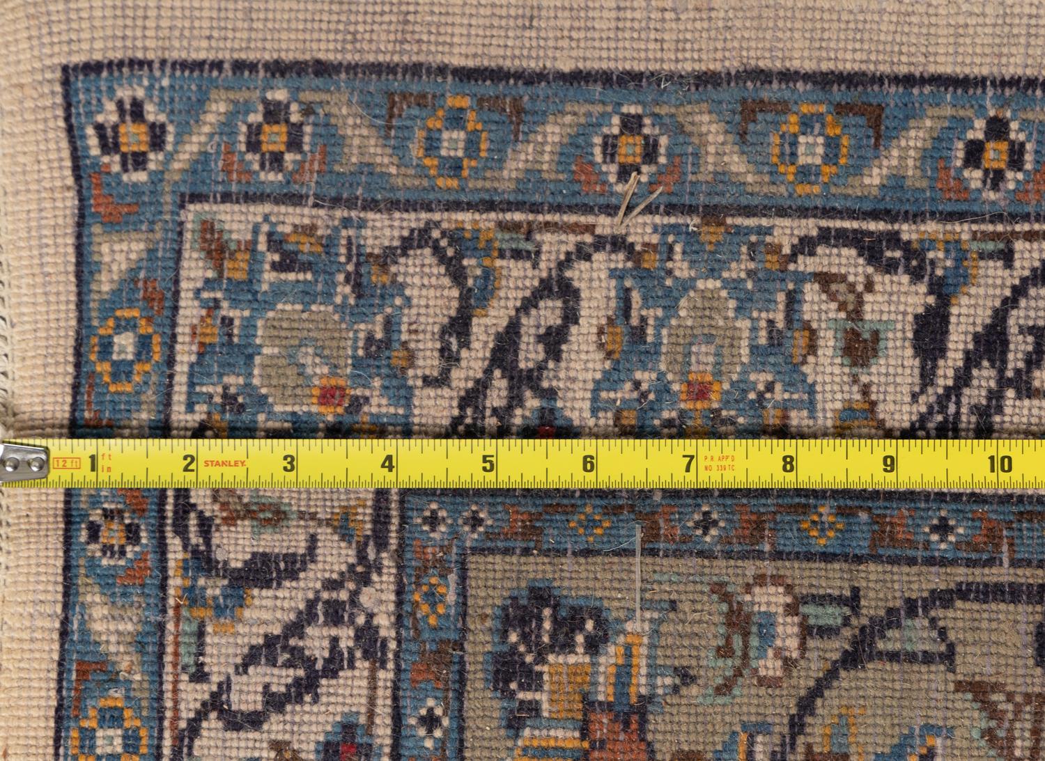 A Kashan Wool Rug