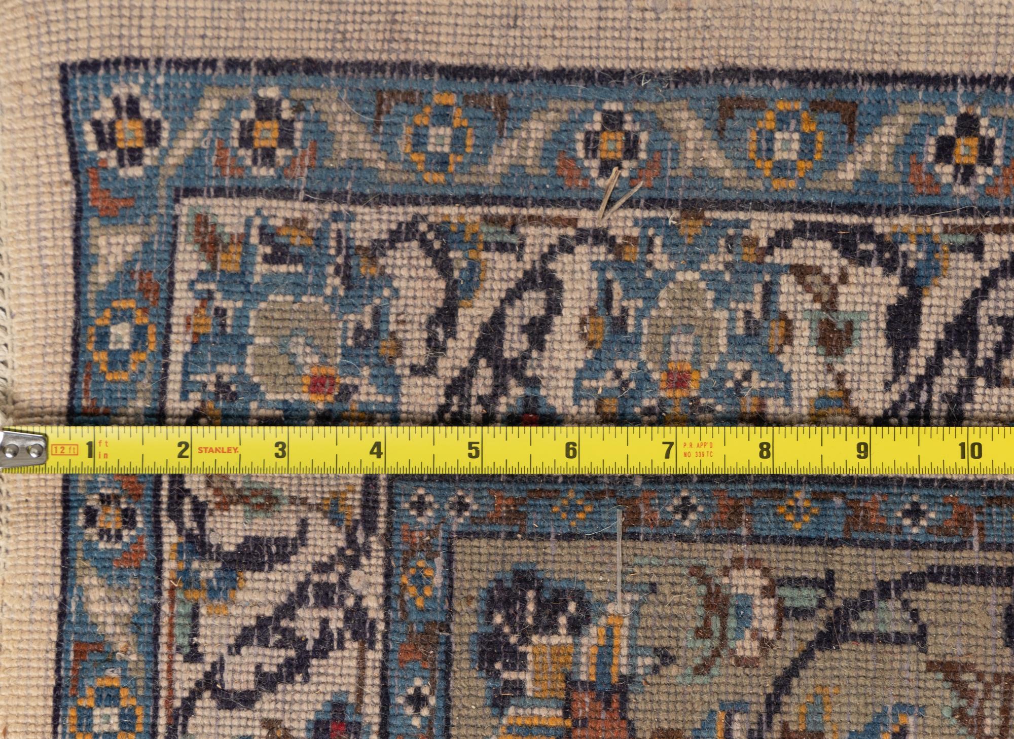 A Kashan Wool Rug