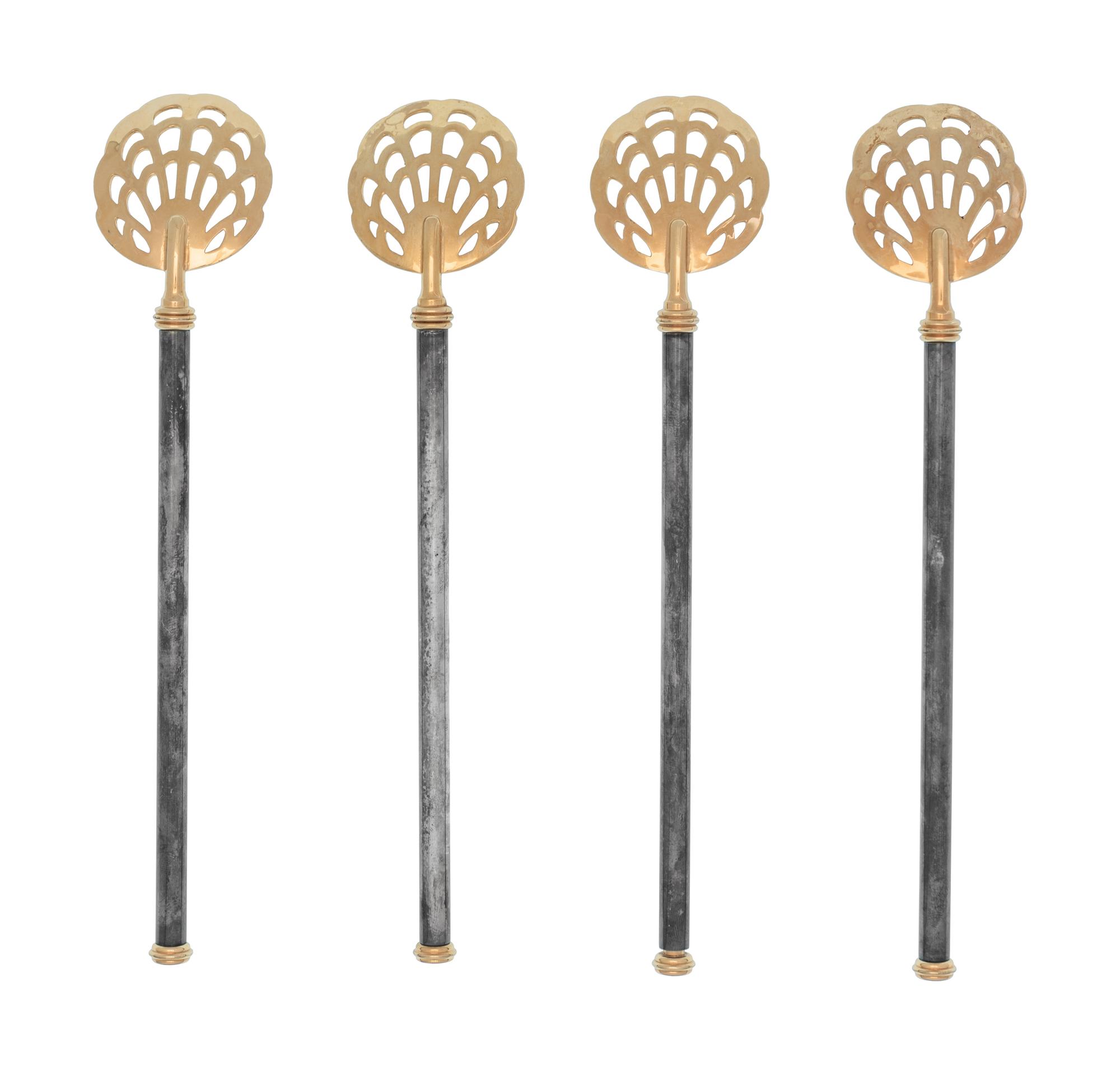 A Group of Petrossian Gold- and Silver-Plate Pierced Caviar Spoons