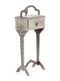 An Art Deco Silvered Metal Smoker's Table