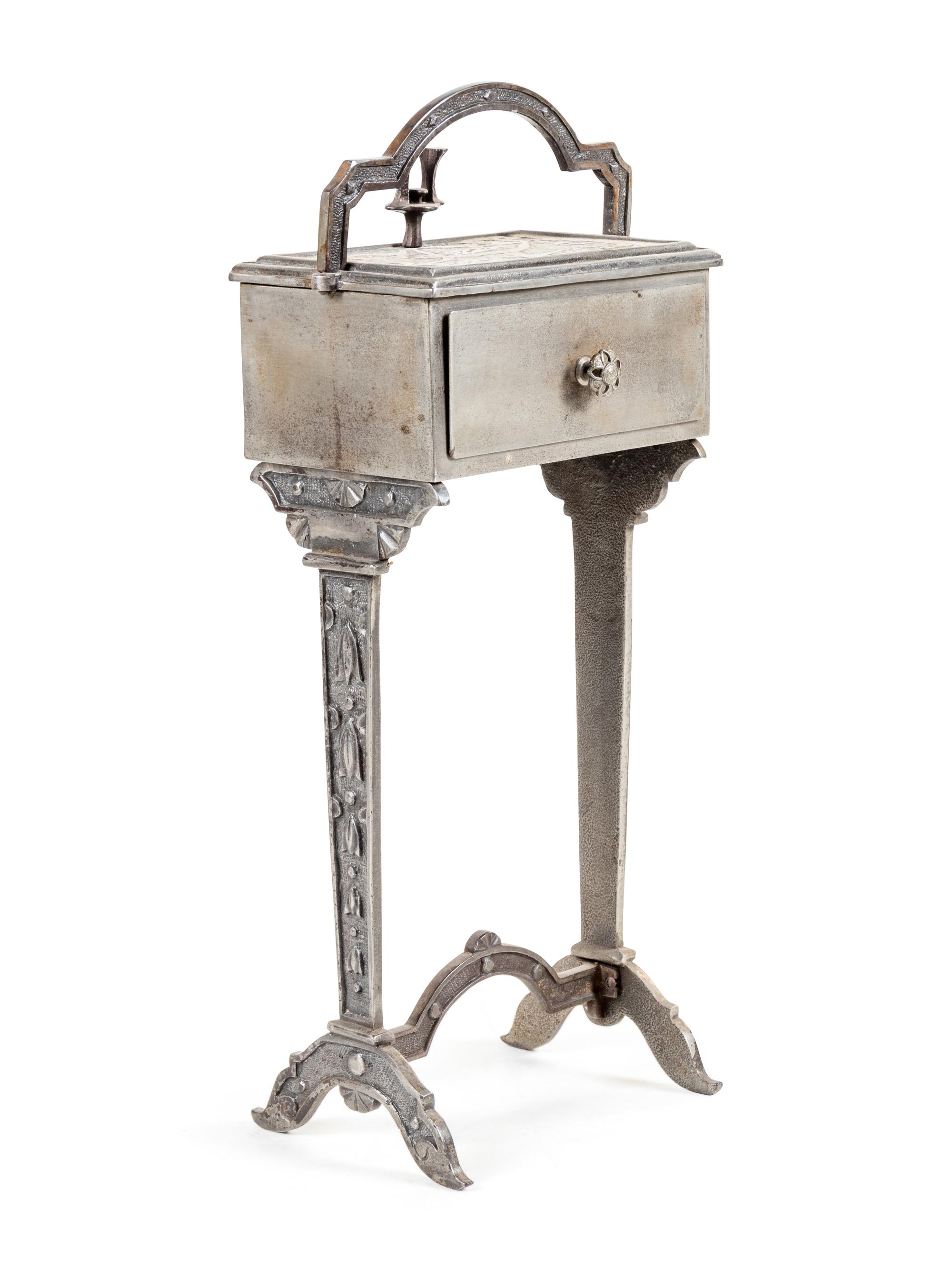An Art Deco Silvered Metal Smoker's Table