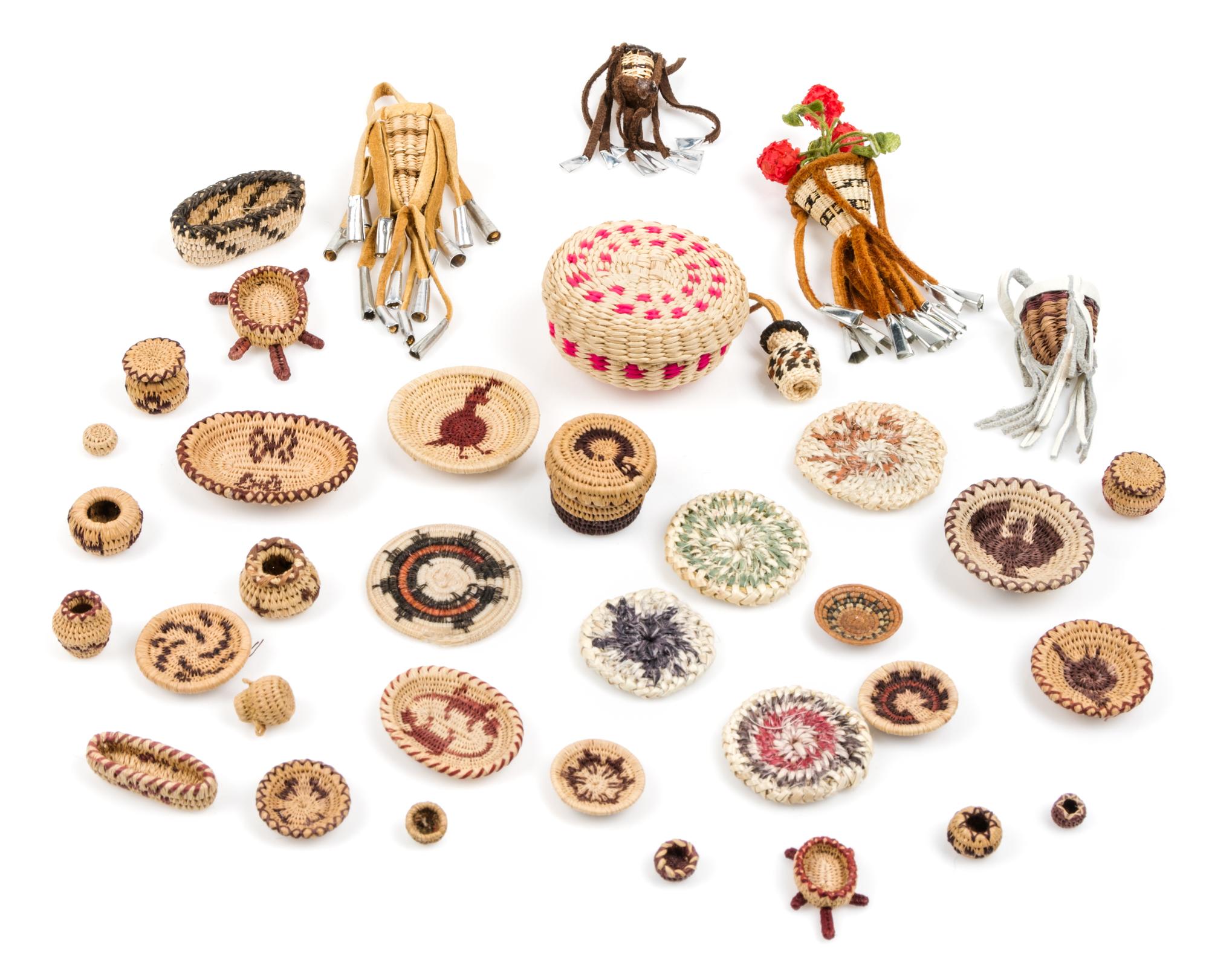 A Collection of Native American Baskets Diameter of largest 1 3/4 inches.