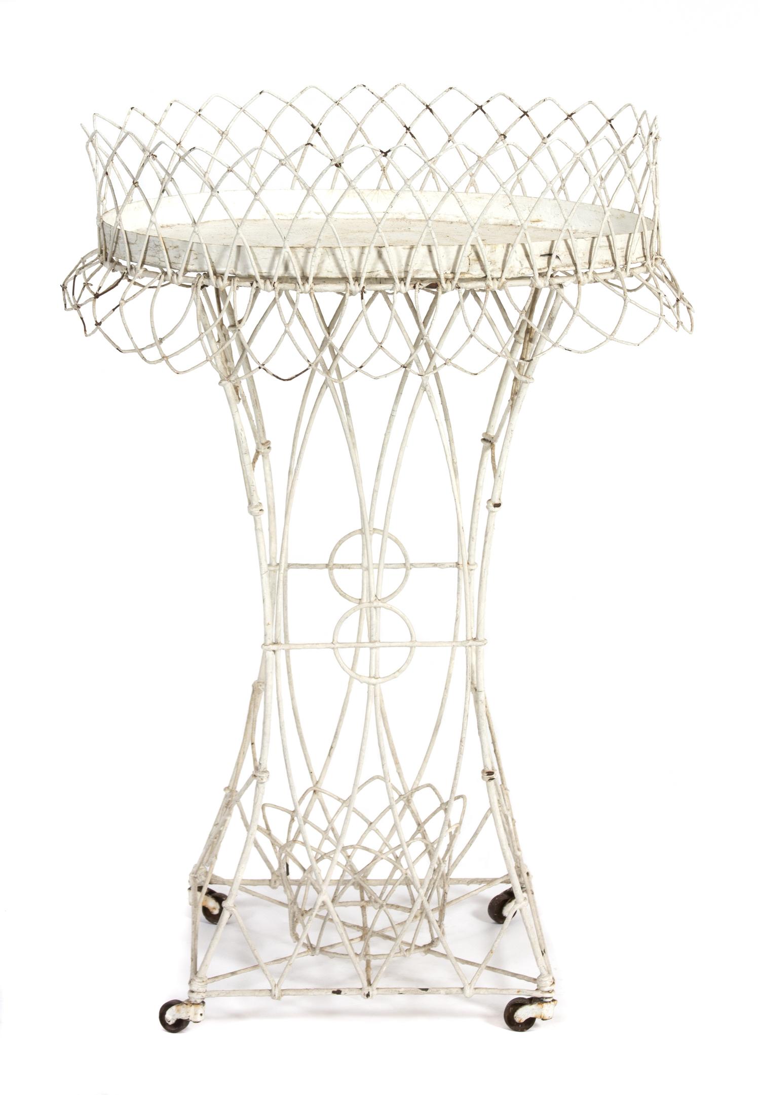 A Victorian Wirework Plant Stand Height 33 x width 23 x depth 14 inches. — LATE 19TH CENTURY