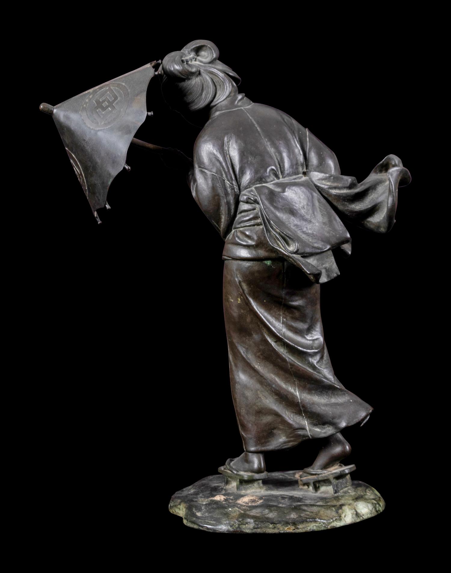 A Japanese Bronze Okimono of A Lady