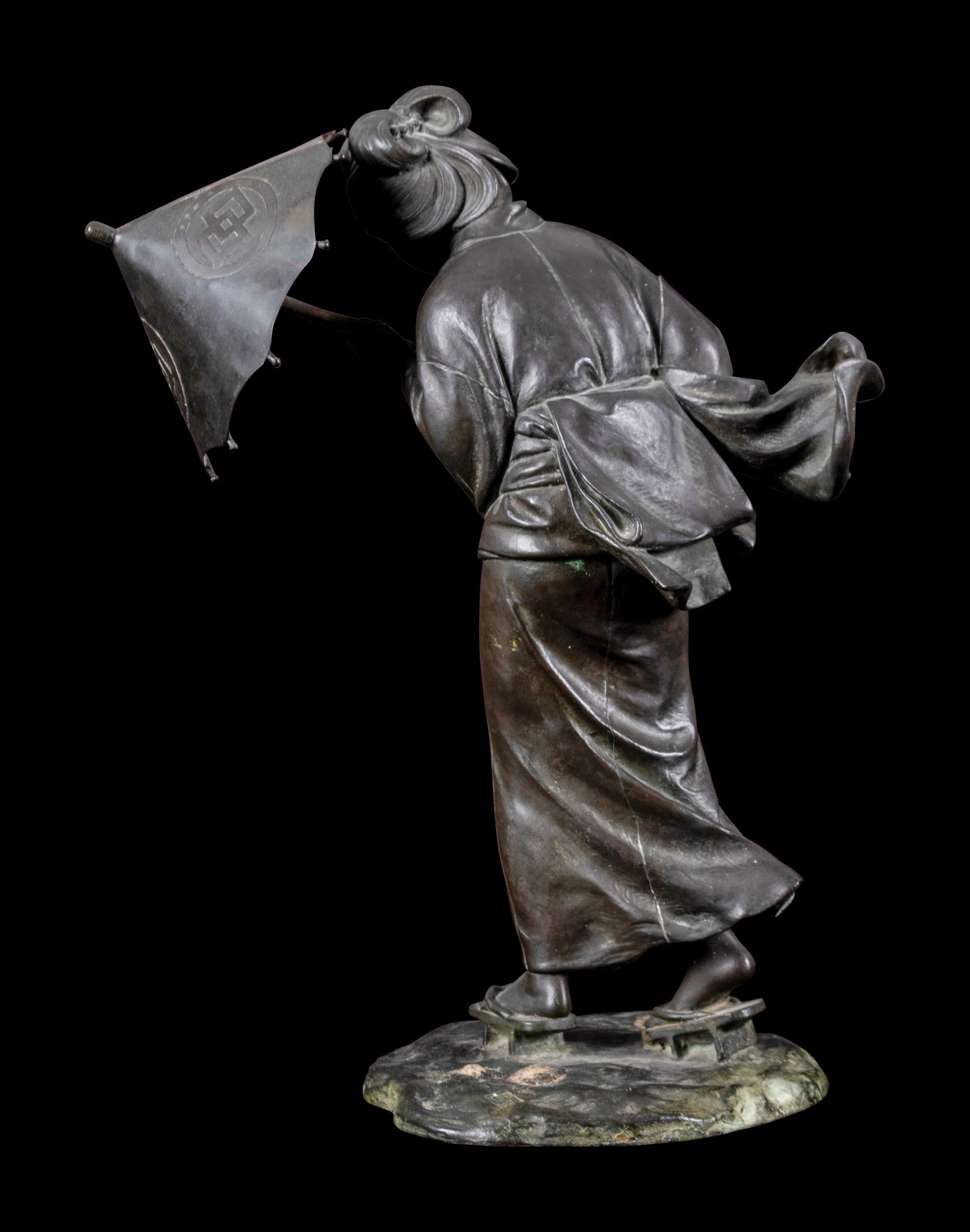 A Japanese Bronze Okimono of A Lady