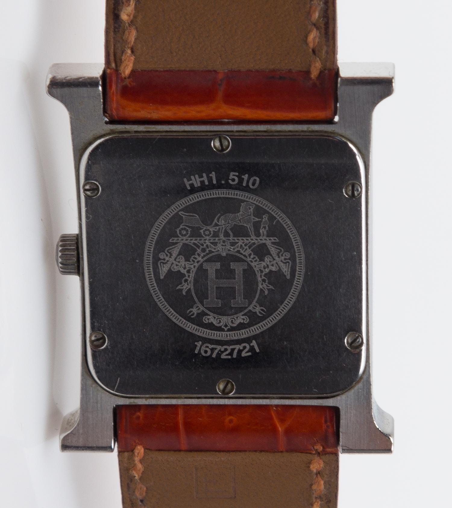 An Hermes Stainless Steel Heure H Wristwatch, Size PM, 9" x 1".