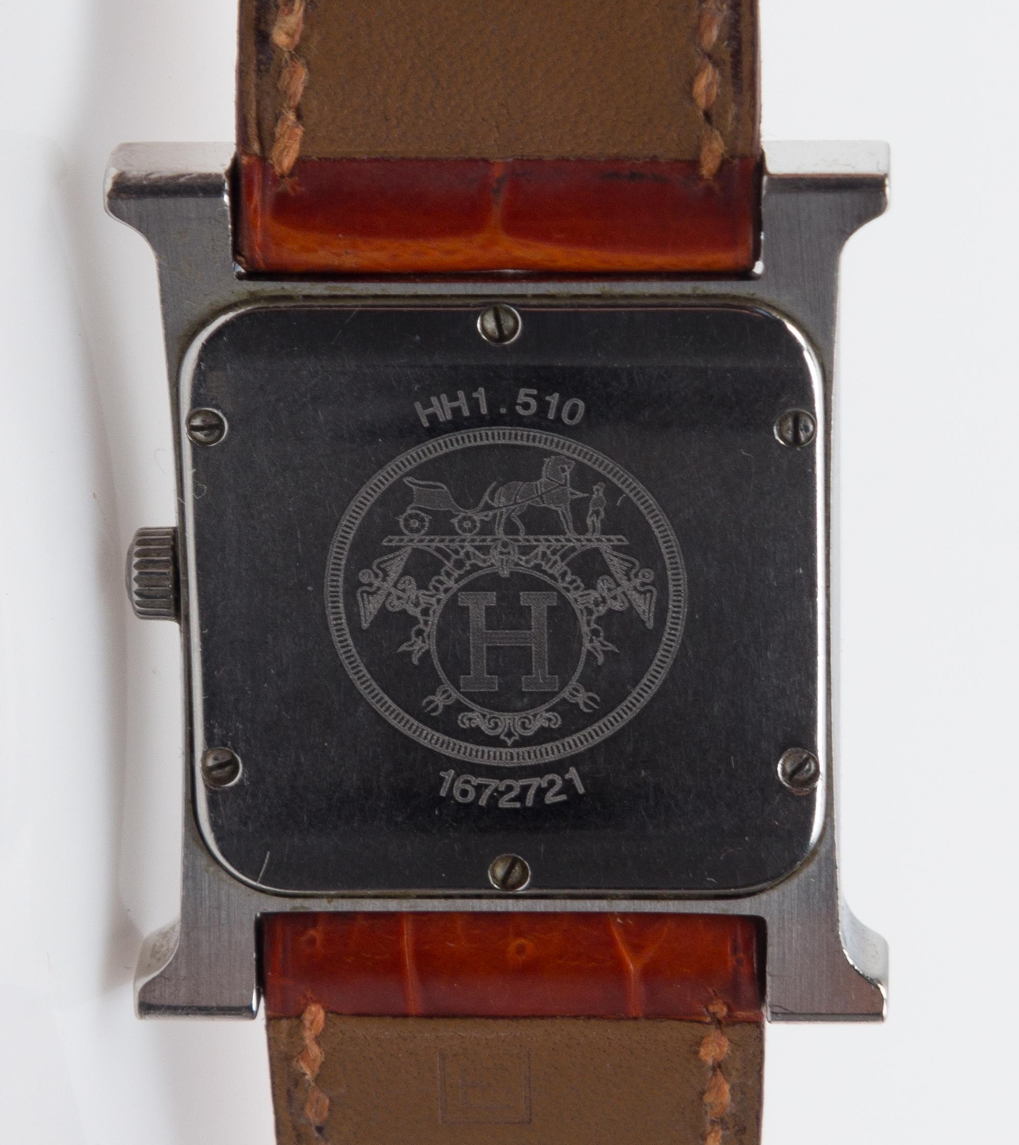 An Hermes Stainless Steel Heure H Wristwatch, Size PM, 9" x 1".