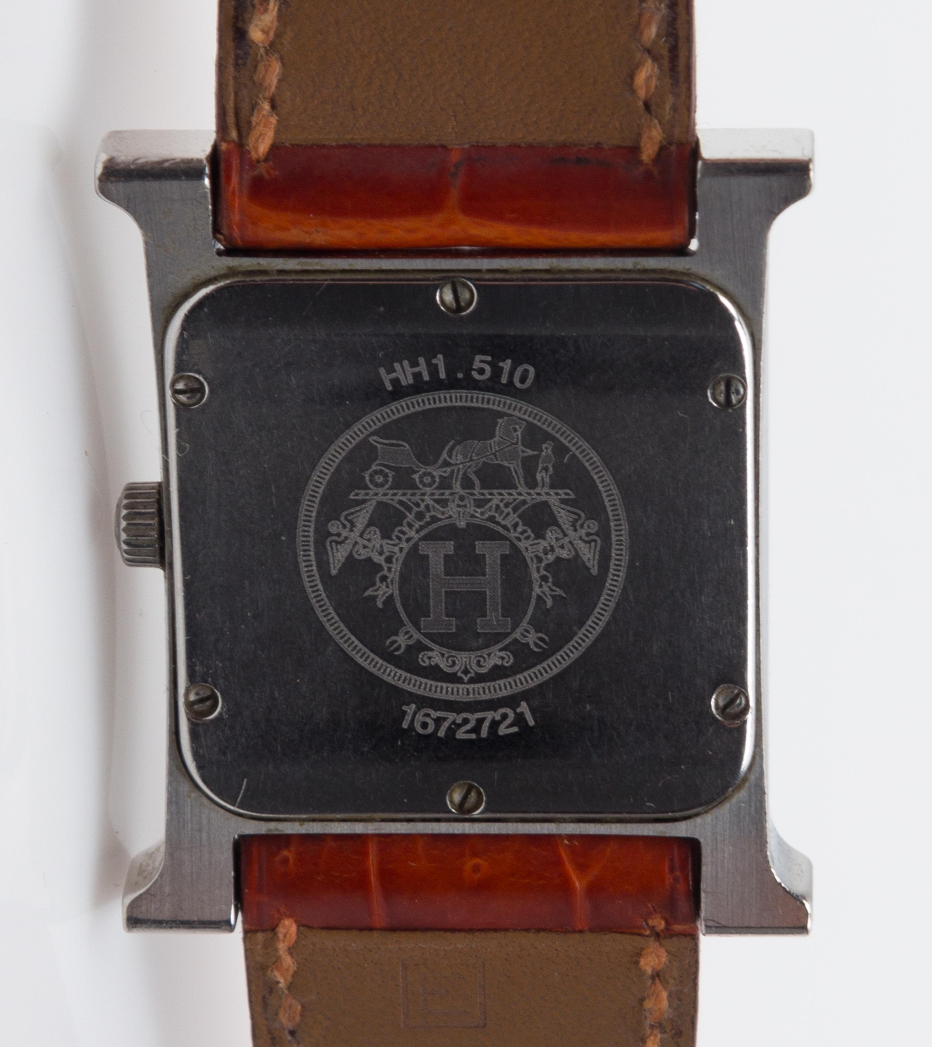 An Hermes Stainless Steel Heure H Wristwatch, Size PM, 9" x 1".
