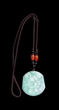 A Celadon and White Jadeite Pendant Length 2 inches. — 20TH CENTURY