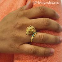 YELLOW GOLD AND GEMSTONE RAM'S HEAD RING
