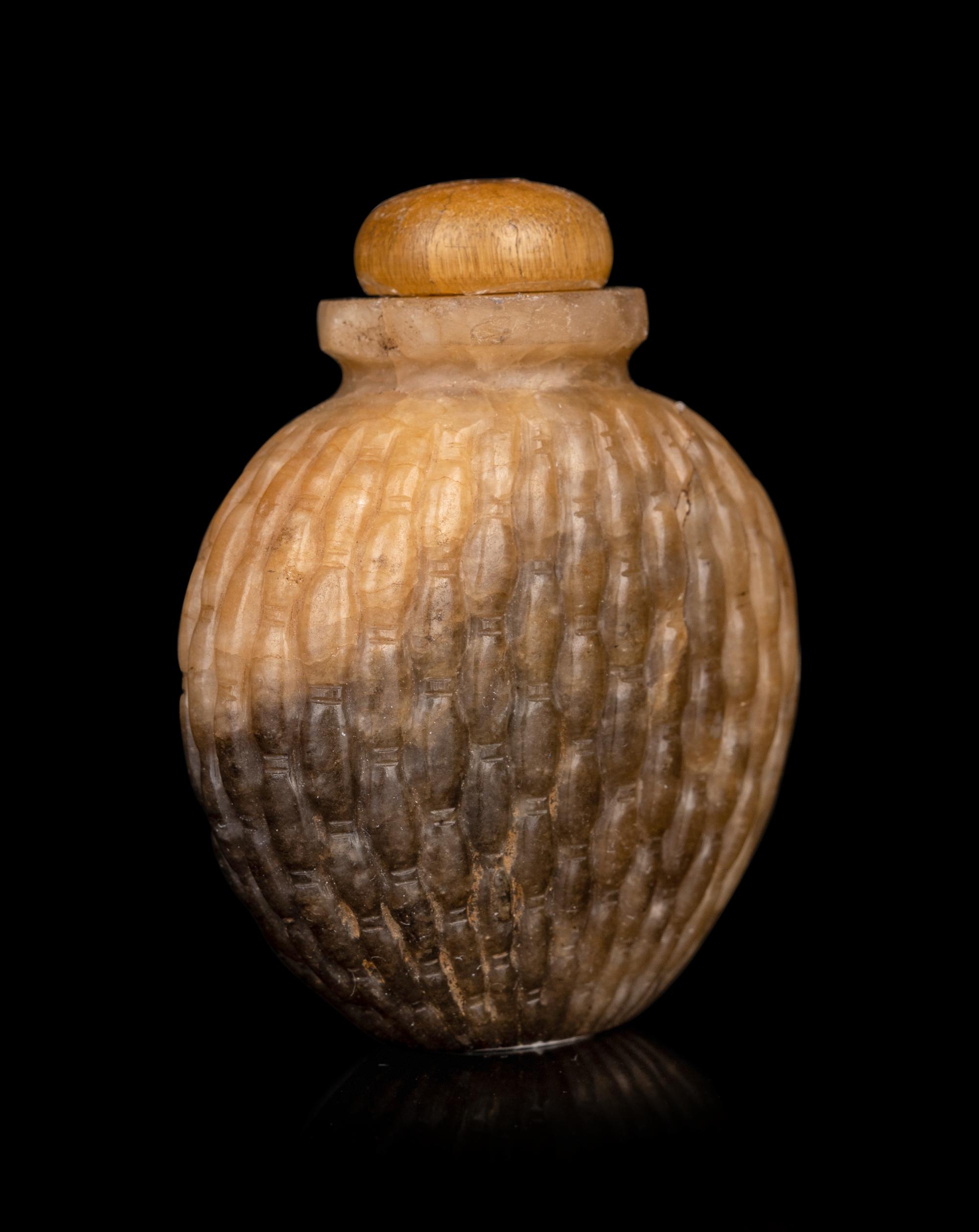 Three Chinese Hardstone Snuff Bottles