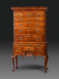 A Queen Anne Shell-Carved and Figured Maple Flat-Top High Chest of Drawers