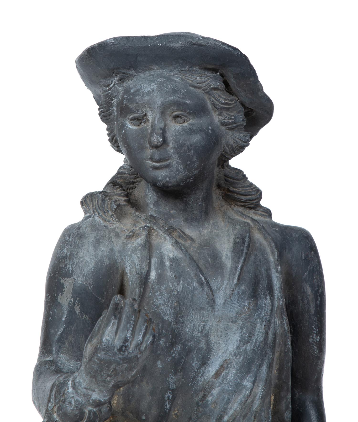 A Cast Lead Garden Figure — EARLY 20TH CENTURY