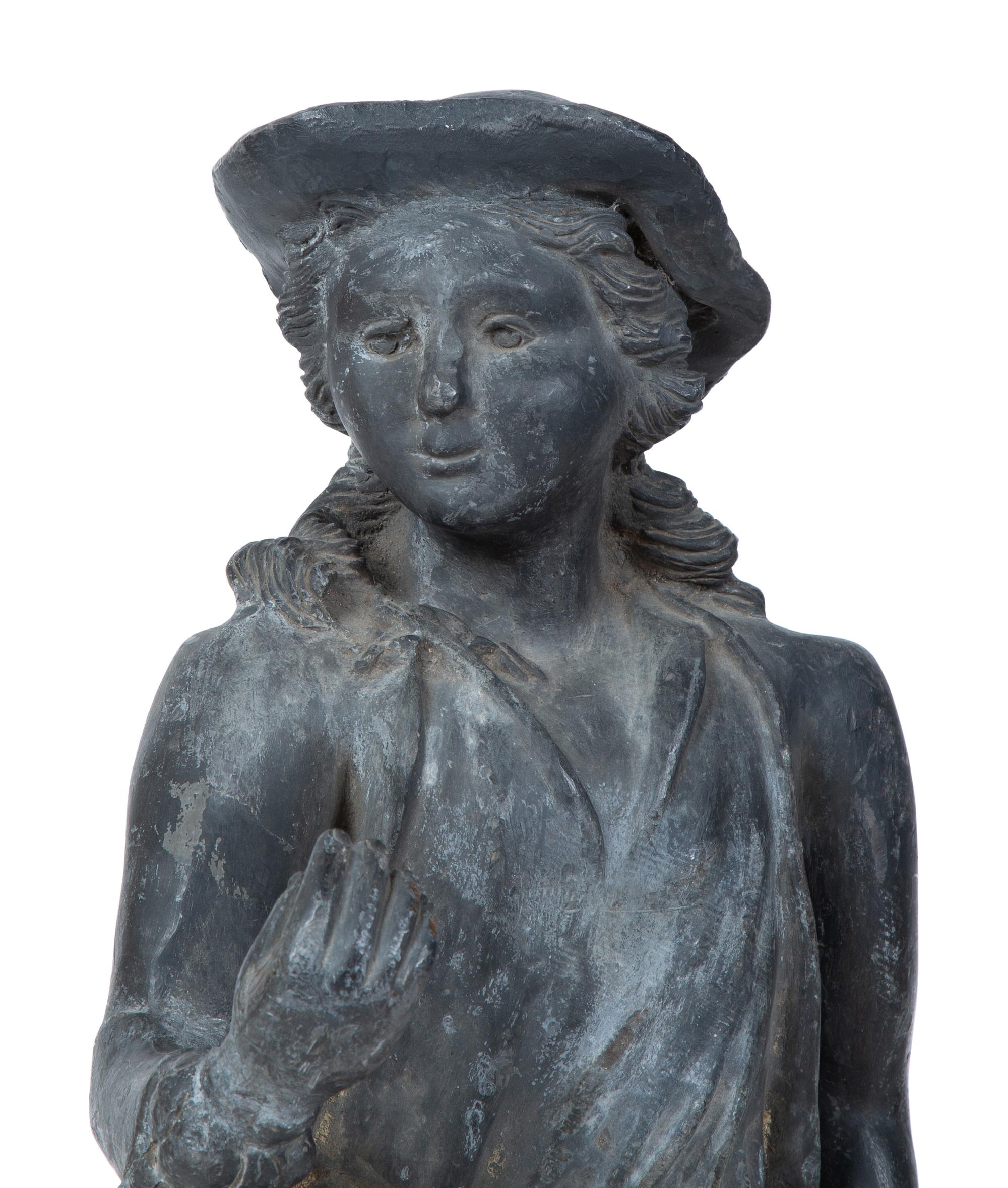 A Cast Lead Garden Figure — EARLY 20TH CENTURY