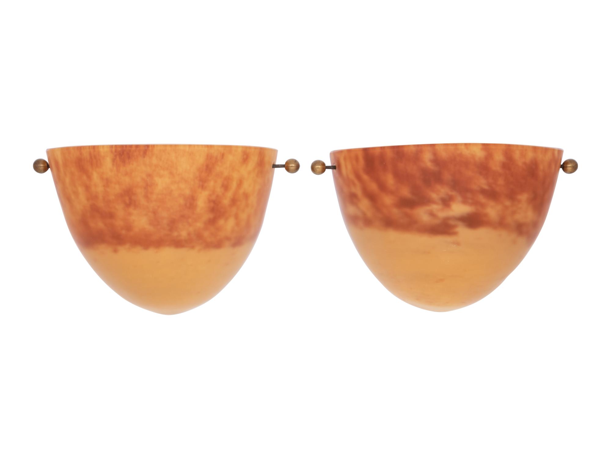A Pair of Colored and Frosted Glass Sconces