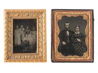 [EARLY PHOTOGRAPHY]. A group of 19 daguerreotypes, ambrotypes, tintypes, and CDVs featuring women, a family, and couples, highlighted by half plate daguerreotype of a young couple.