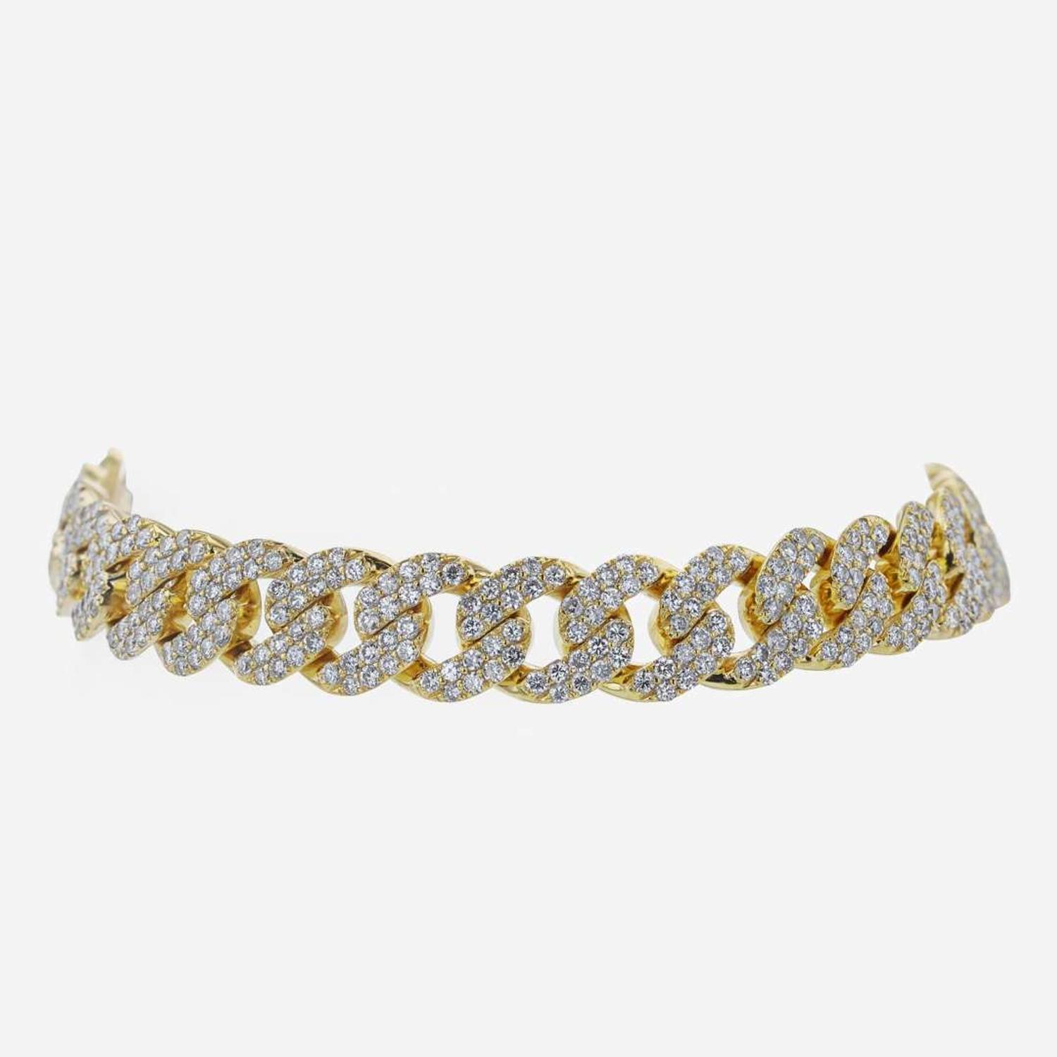 A Diamond and 14K Yellow Gold Cuban Link Bracelet