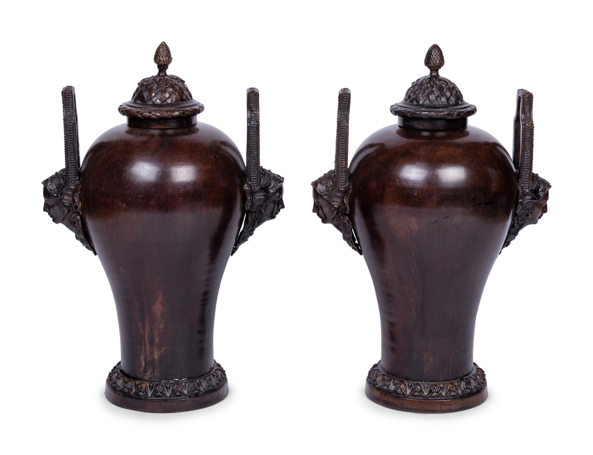 A Pair of Neoclassical Style Patinated Bronze Covered Urns