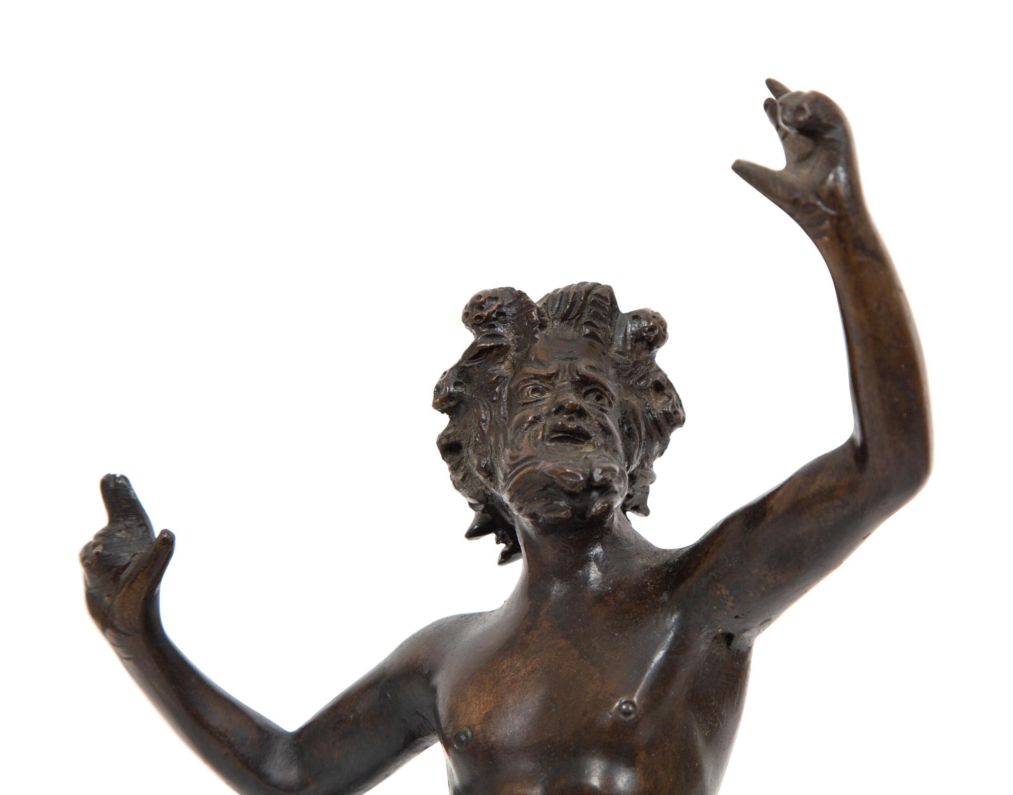 A Continental Bronze Figure of the Dancing Faun