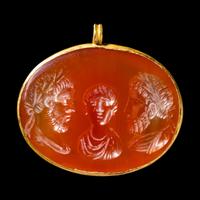 A Roman Carnelian and Gold Pendant with Emperors Balbinus, Gordian III, and Pupienus