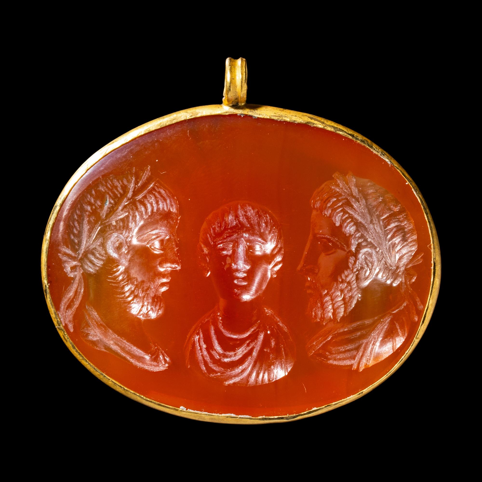 A Roman Carnelian and Gold Pendant with Emperors Balbinus, Gordian III, and Pupienus