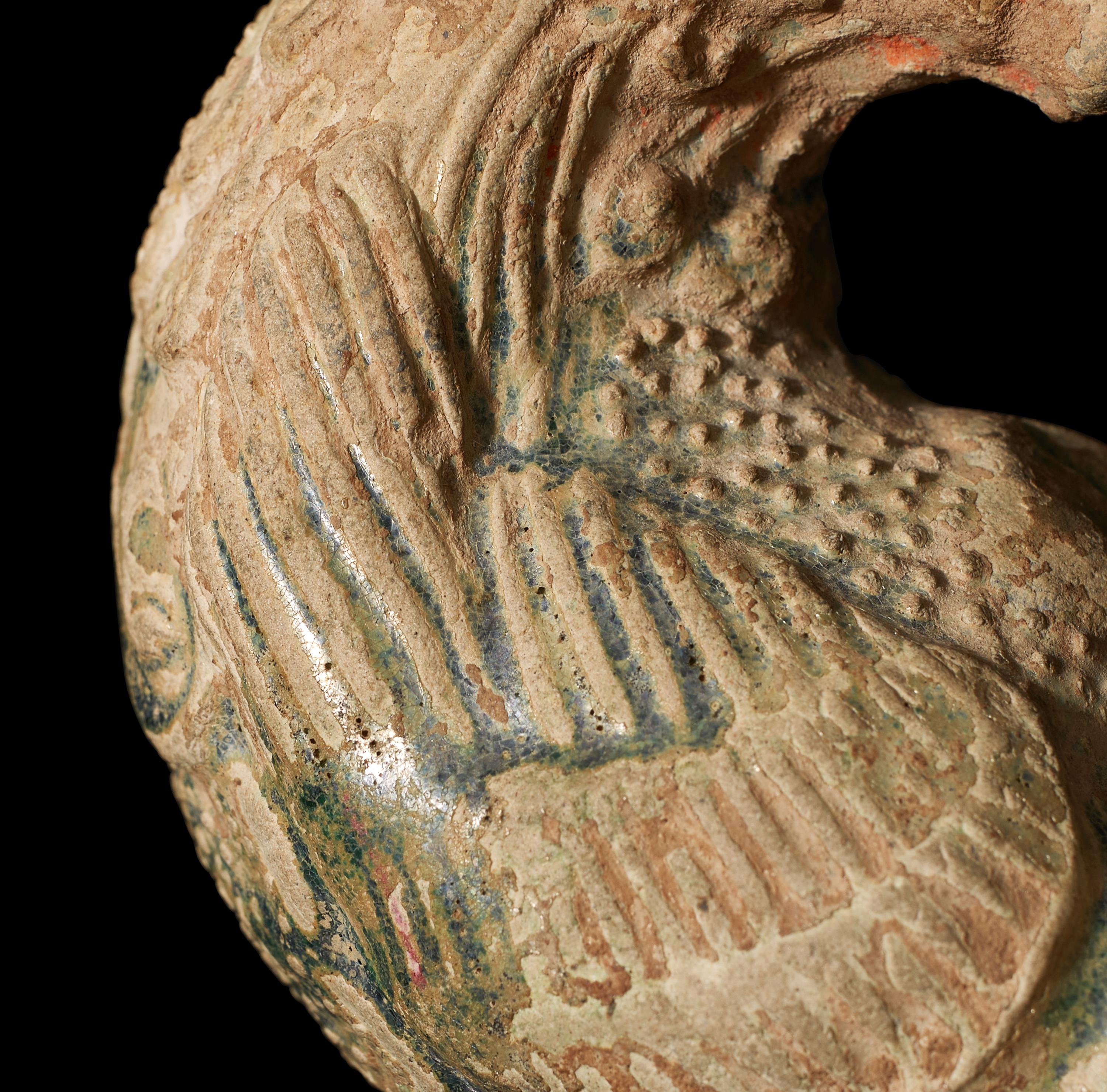 A Chinese Green Glazed Pottery 'Parrot' Rhyton Cup, Tang Dynasty 唐 綠釉鸚鵡杯